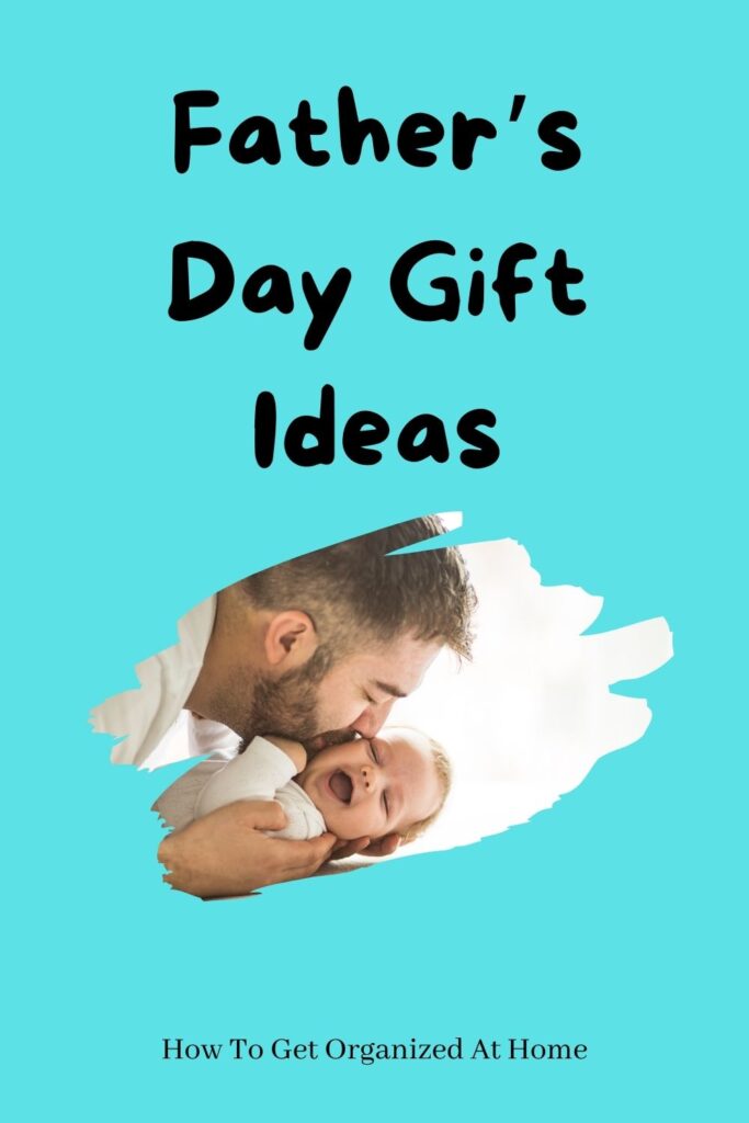 father kissing a baby. Words father's day gift ideas