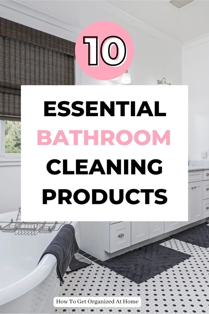  A plain bathroom with grey accessories and the words: 10 essential cleaning products on the image
