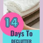 clothes in a tidy pile with the words 14 days to declutter your home