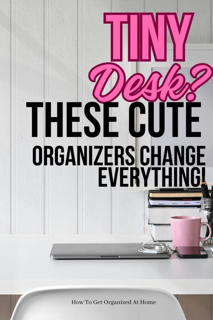 The words Tiny Desk? These Cute Organizers Change Everything are above a picture of a white minimal desk with a laptop and a pink cup with a stack of books behind.
